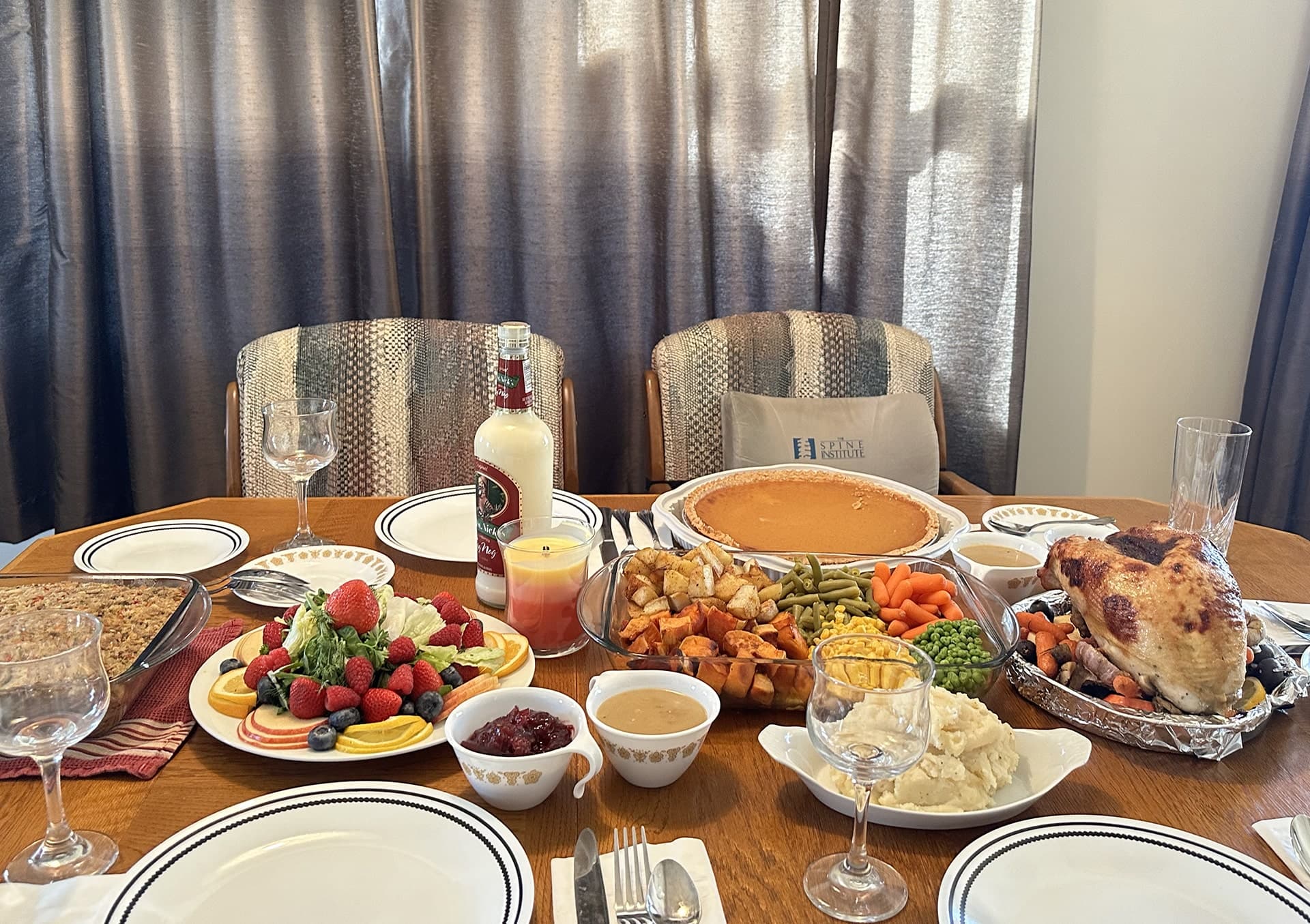A family dinner table set with home-cooked dishes